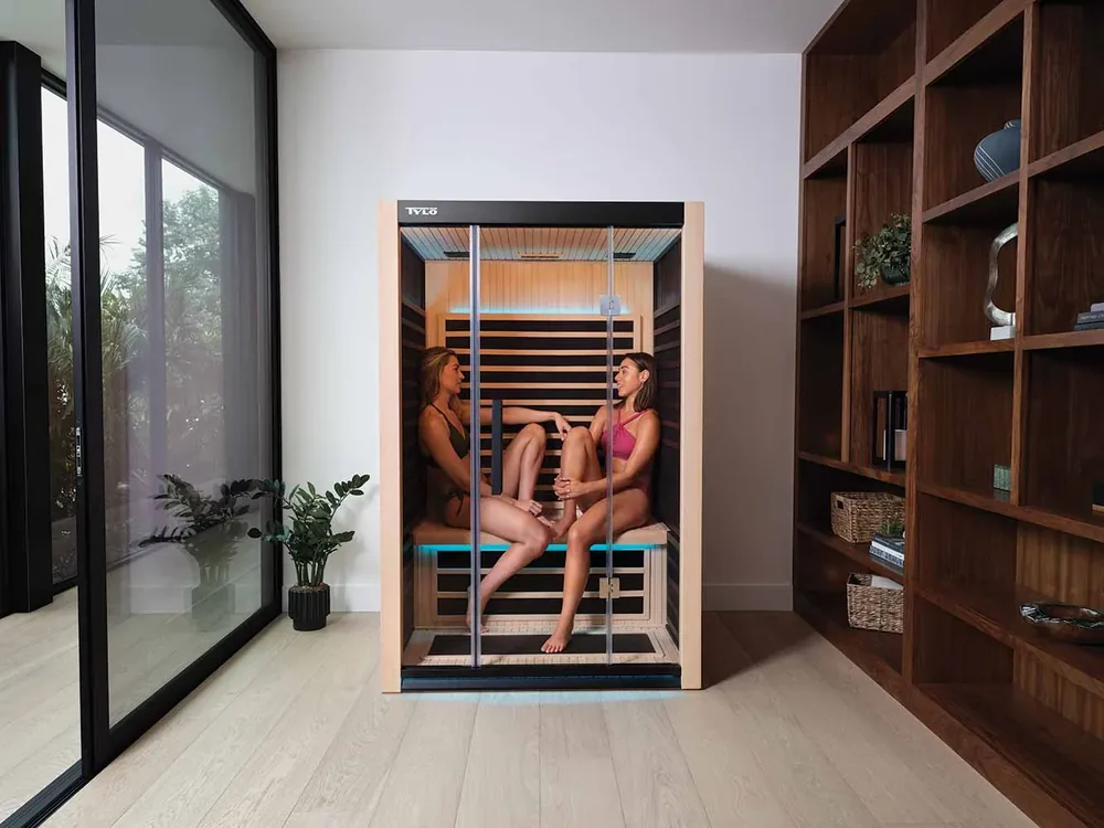 Tylö sauna with two people relaxing inside
